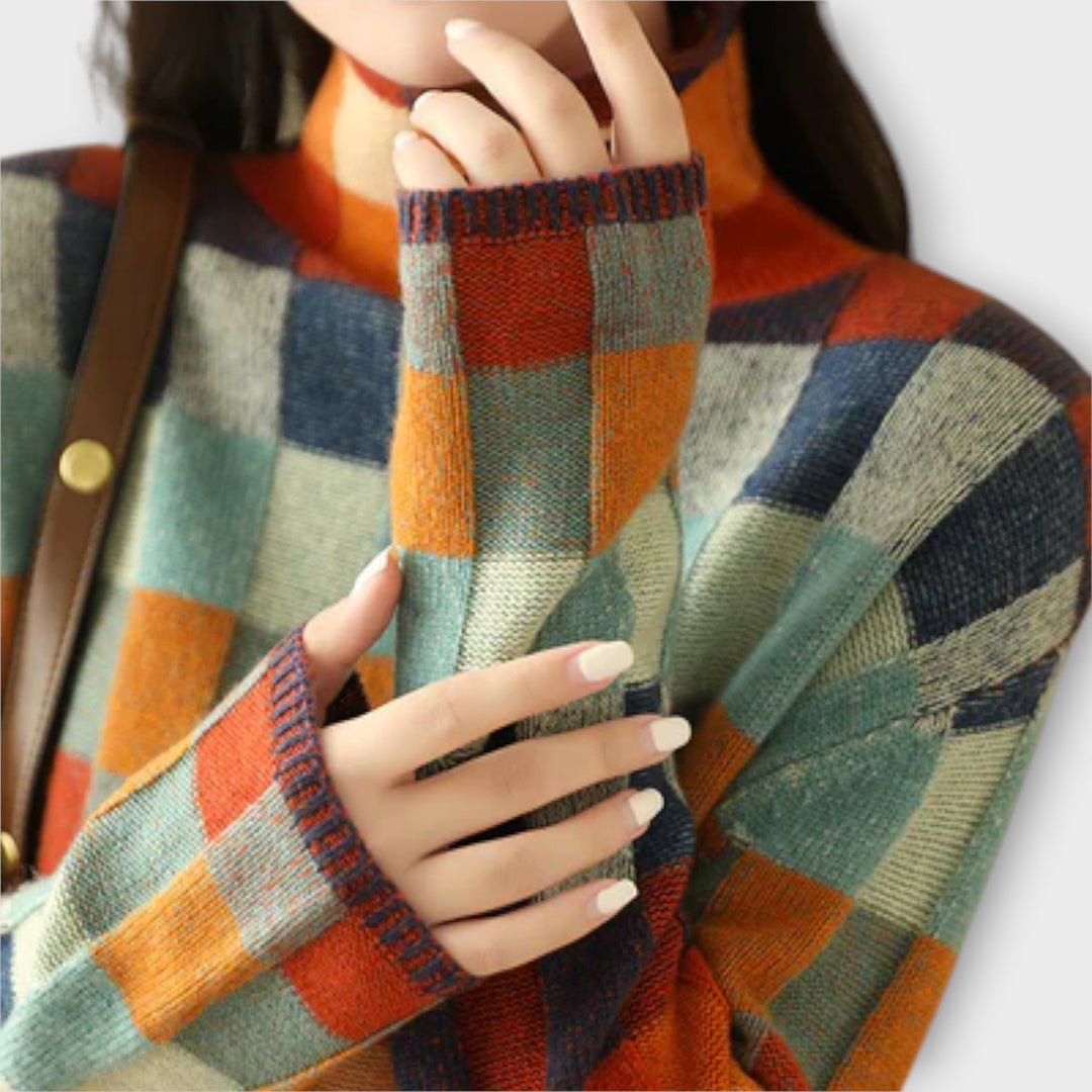 Erika - Jersey de patchwork colorido con cuello alto