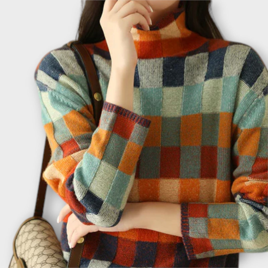 Erika - Jersey de patchwork colorido con cuello alto