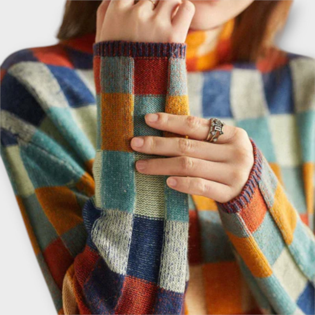 Erika - Jersey de patchwork colorido con cuello alto