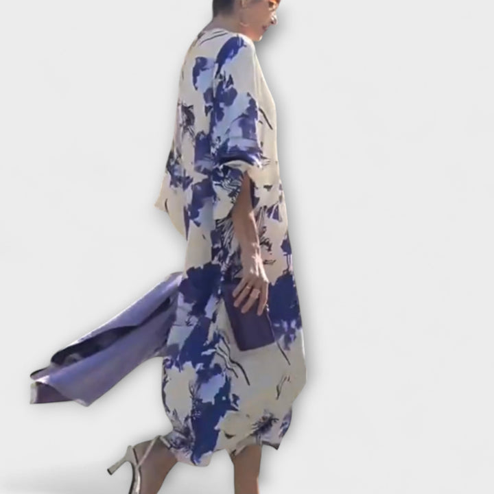 María - Vestido blanco y lila con estampado de flores