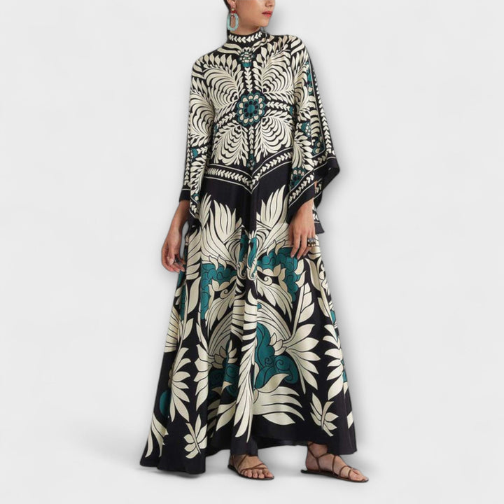 Giselle - Vestido maxi negro con estampado de hojas
