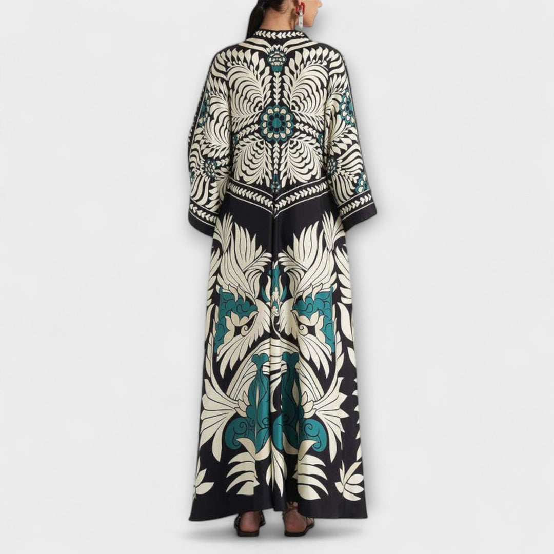 Giselle - Vestido maxi negro con estampado de hojas