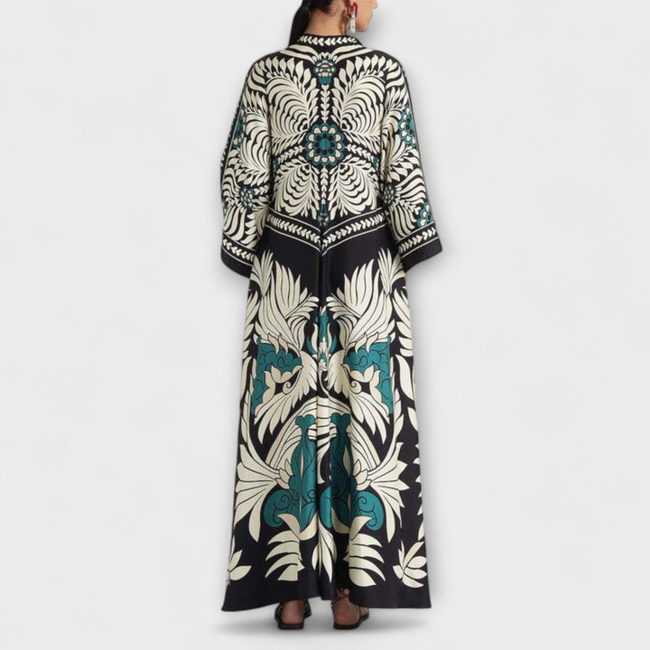 Giselle - Vestido maxi negro con estampado de hojas